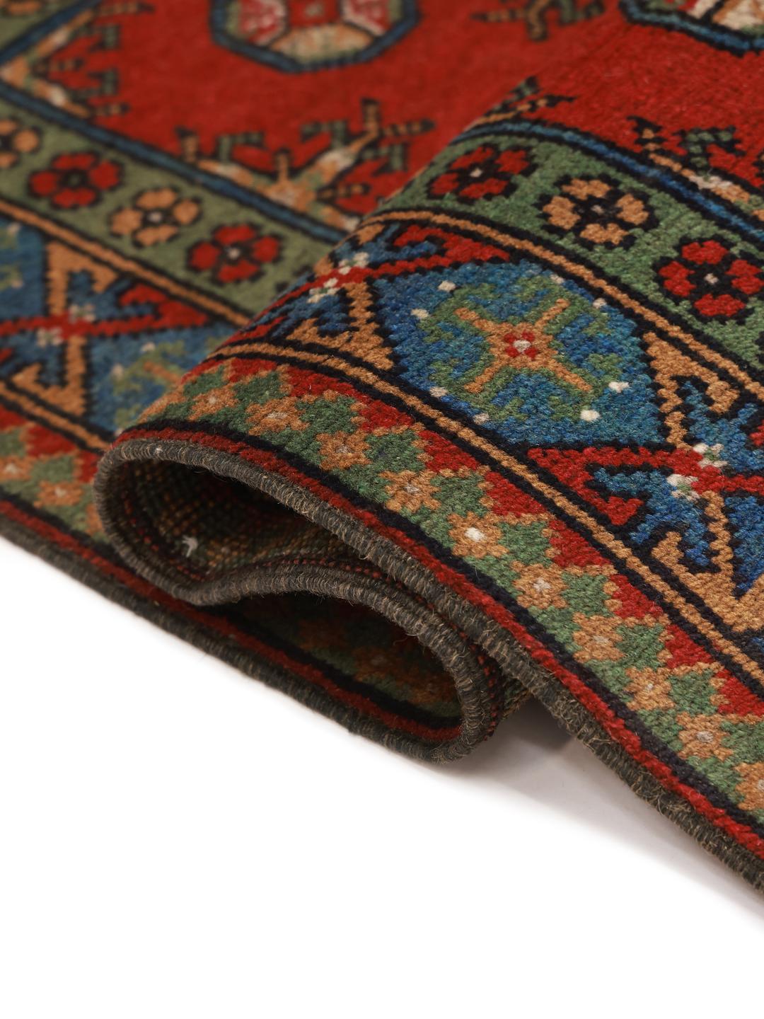 Hand-knotted red and blue Afghan Fine rug with geometric patterns