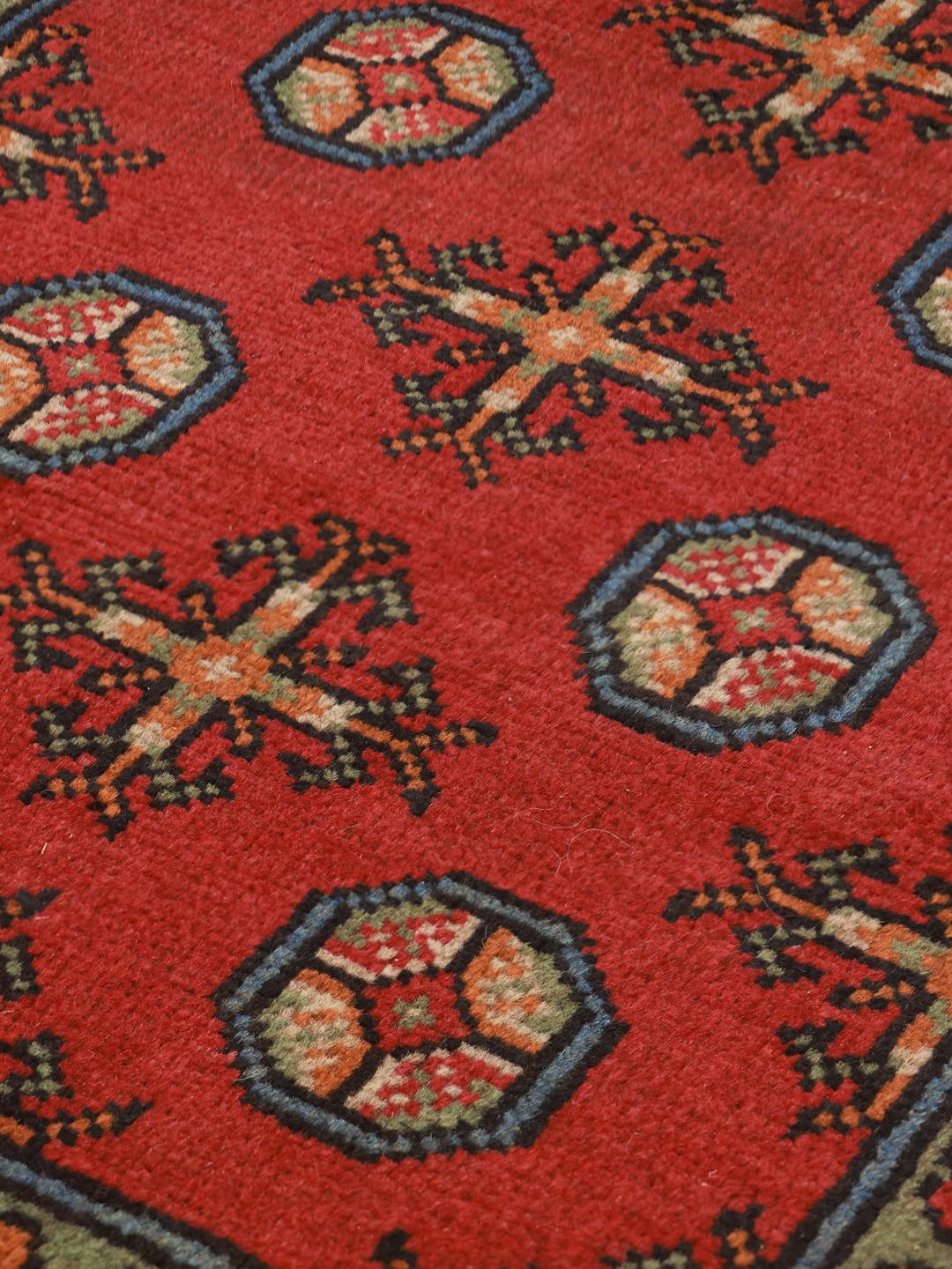 Hand-knotted red and multicolor Afghan Fine rug