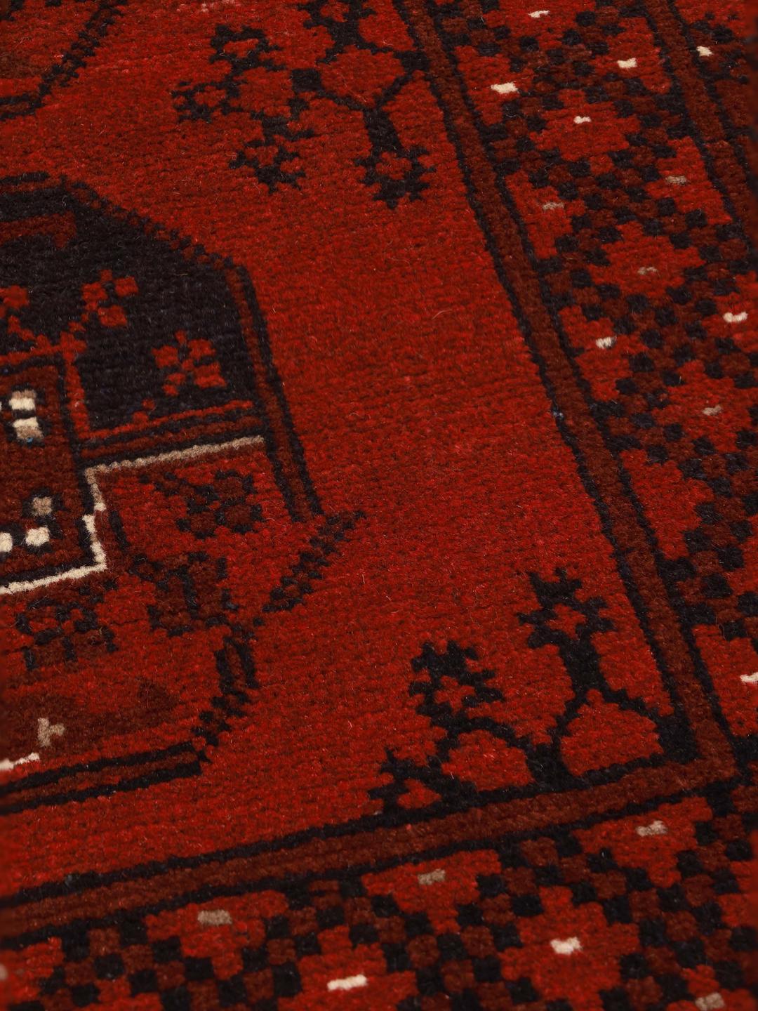 Hand-knotted Afghan Fine wool rug in red and dark blue