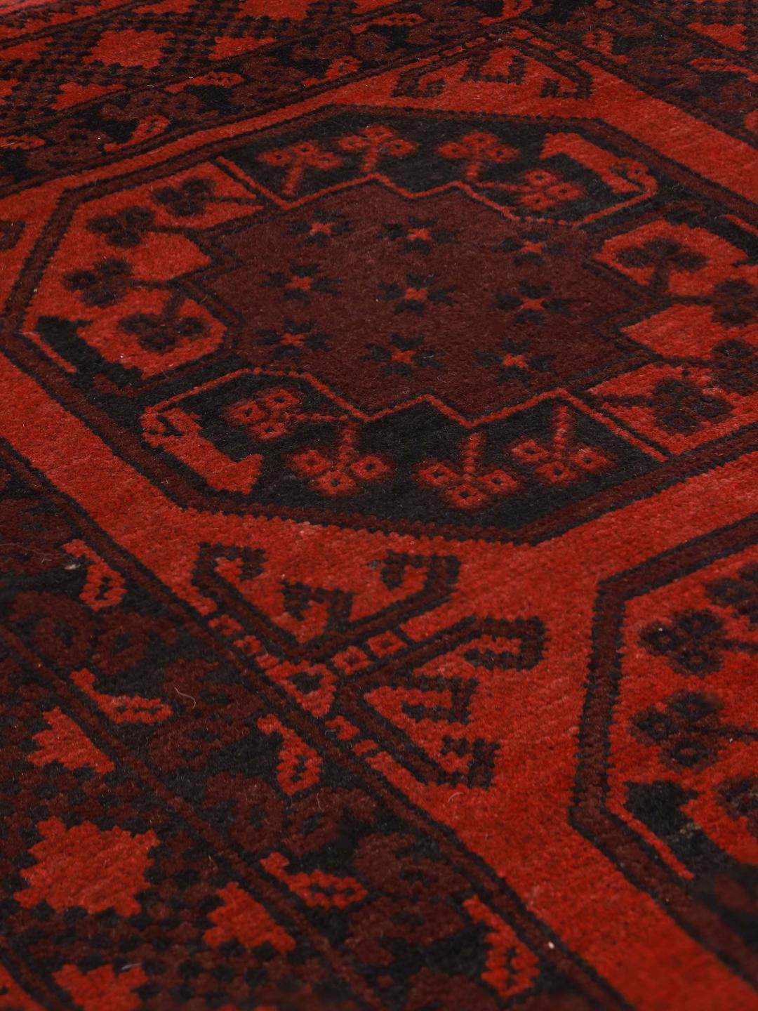 Hand-knotted Afghan rug in red and dark grey