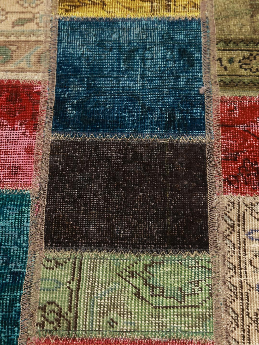 Ręcznie wiązany wielokolorowy turecki chodnik Patchwork z tradycyjnymi motywami plemiennymi