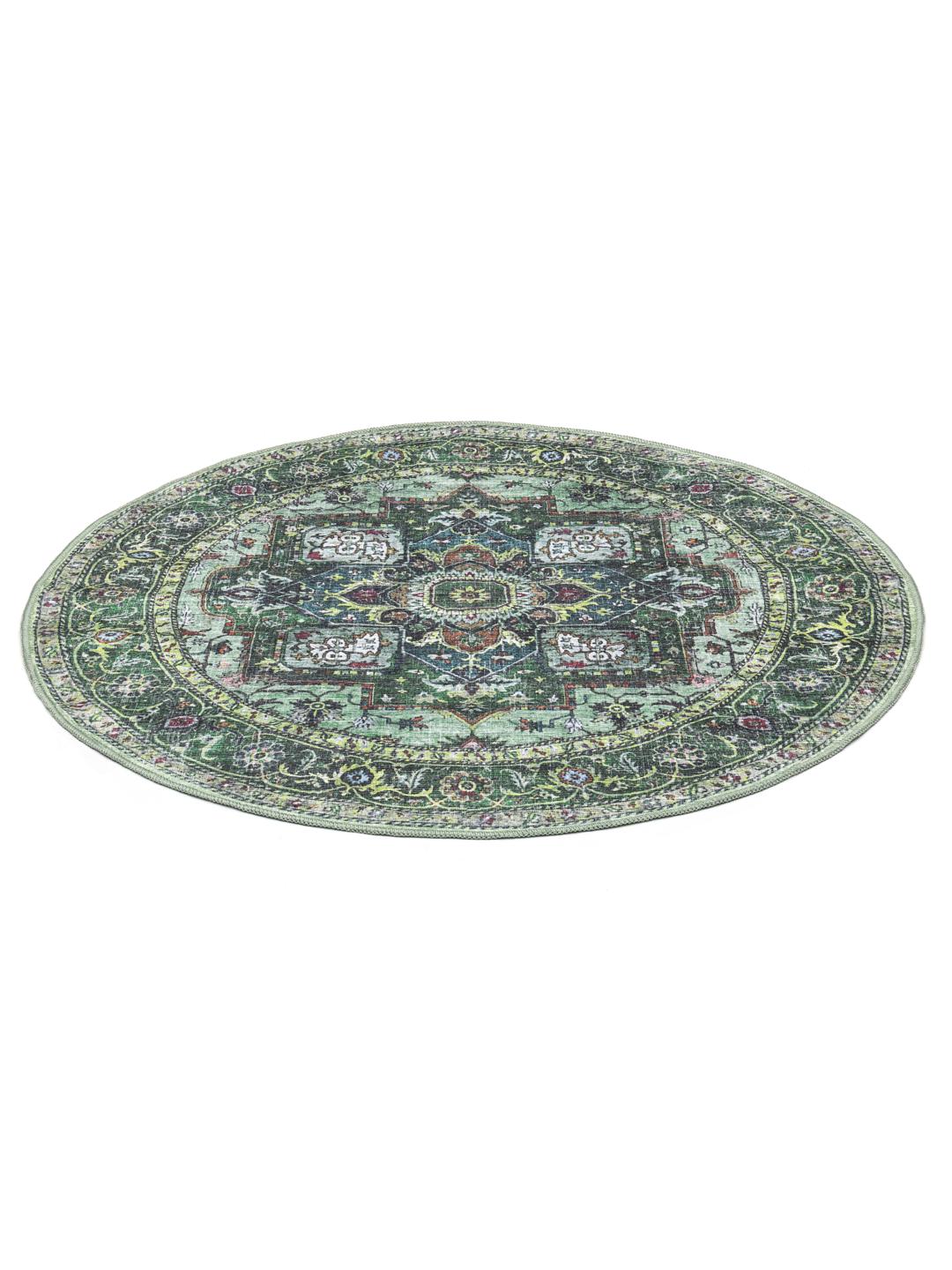 Rond groen tapijt met traditionele oosterse patronen