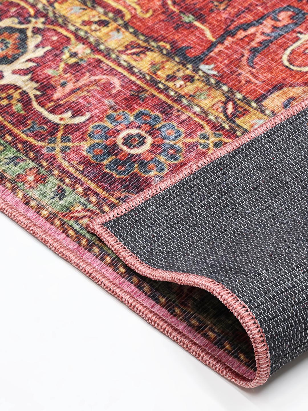 red and pink rug
