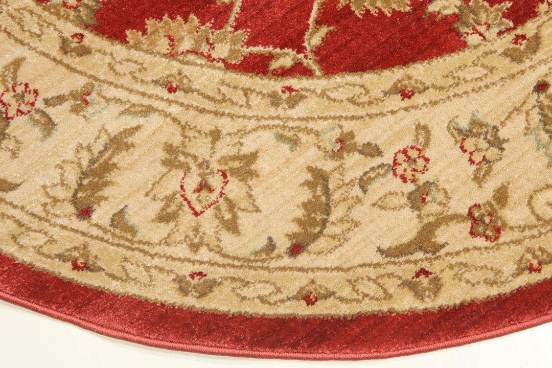 Tapis rond rouge avec motif floral