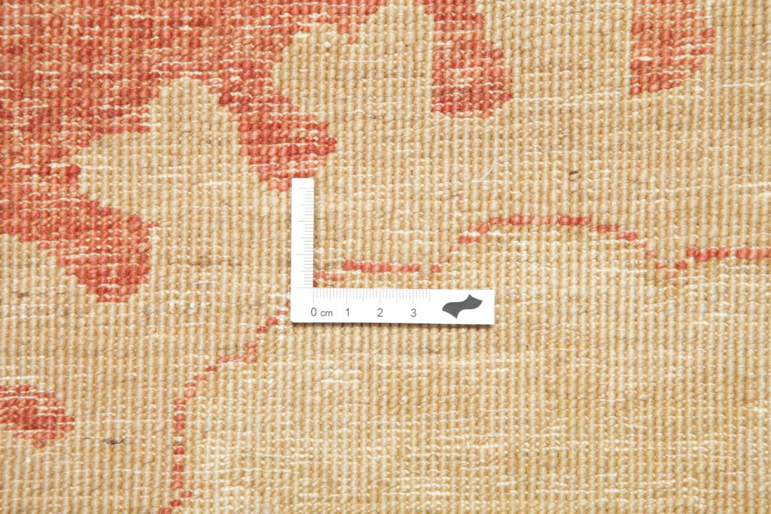 Large hand-knotted Ziegler Fine rug from Pakistan in beige and red tones.