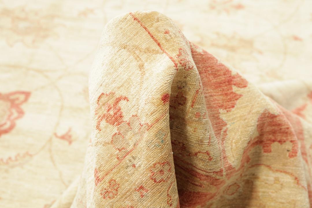 Large hand-knotted Ziegler Fine rug from Pakistan in beige and red tones.