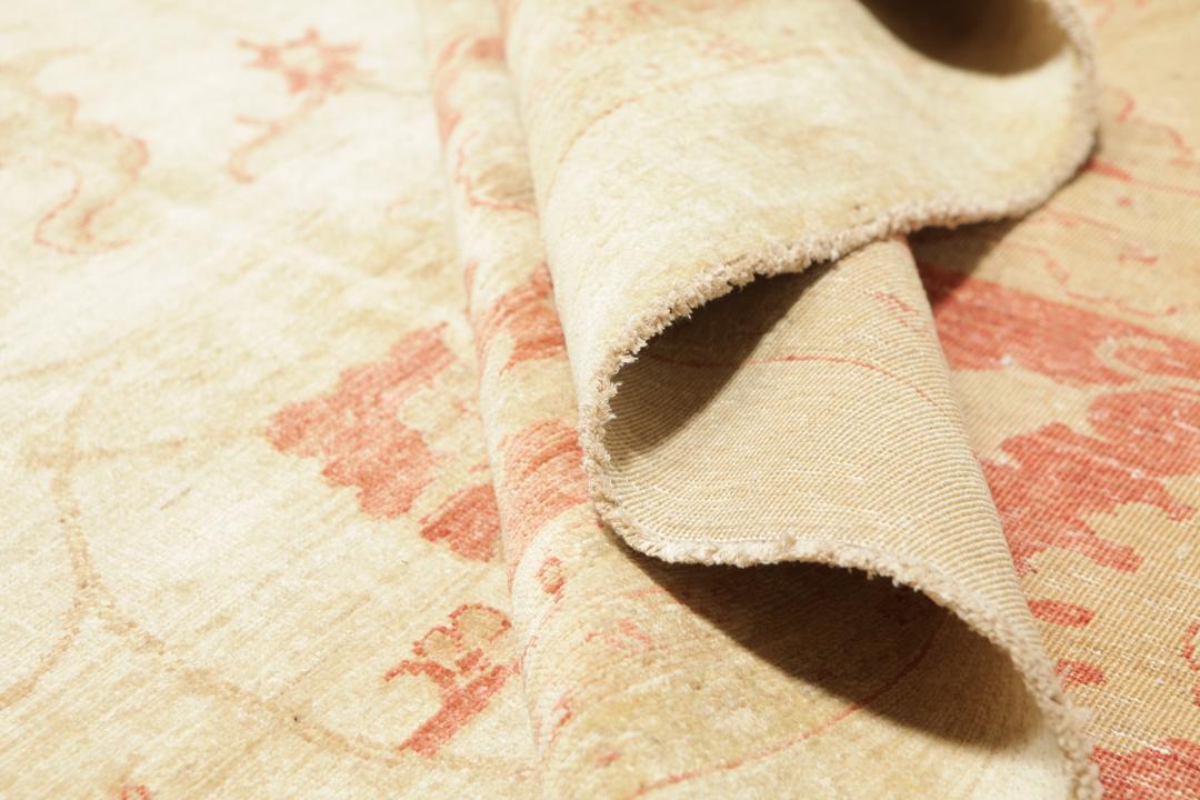 Large hand-knotted Ziegler Fine rug from Pakistan in beige and red tones.