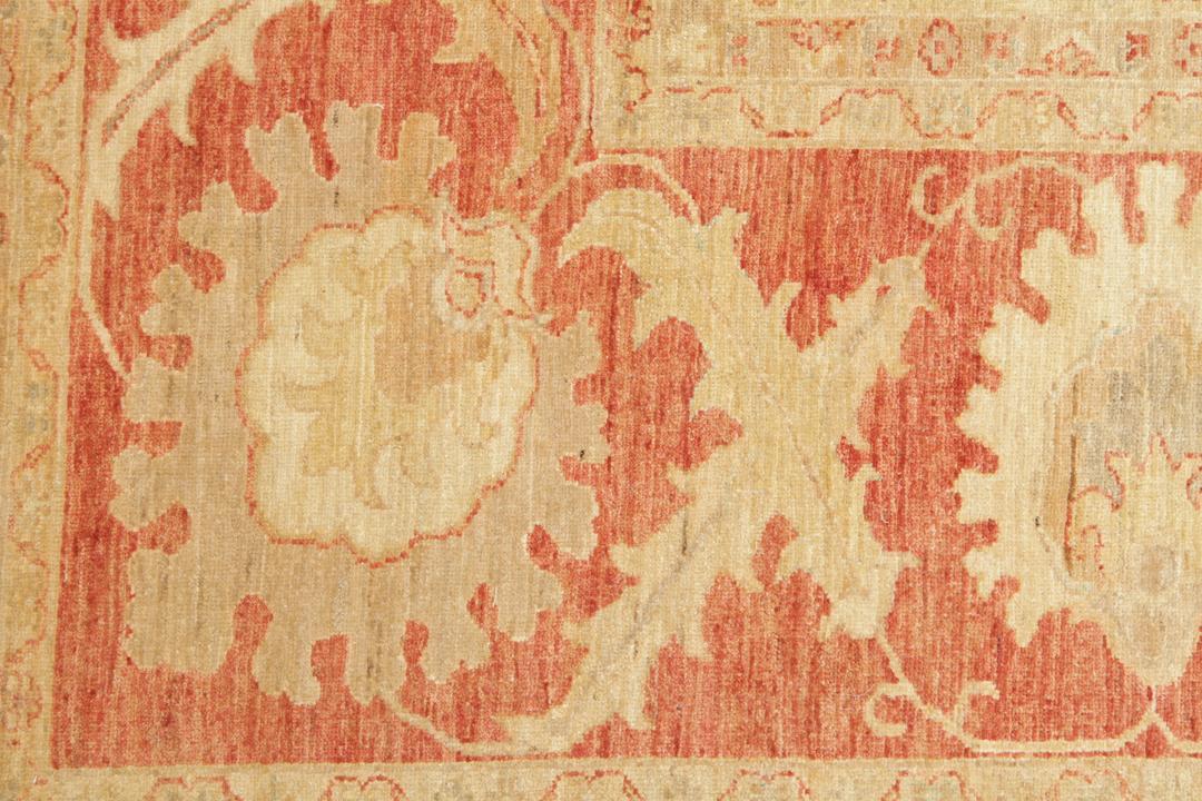 Large hand-knotted Ziegler Fine rug from Pakistan in beige and red tones.