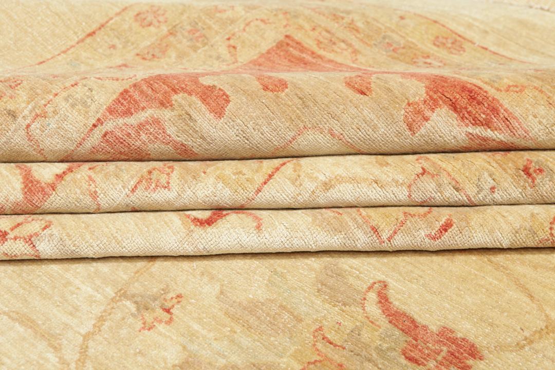 Large hand-knotted Ziegler Fine rug from Pakistan in beige and red tones.