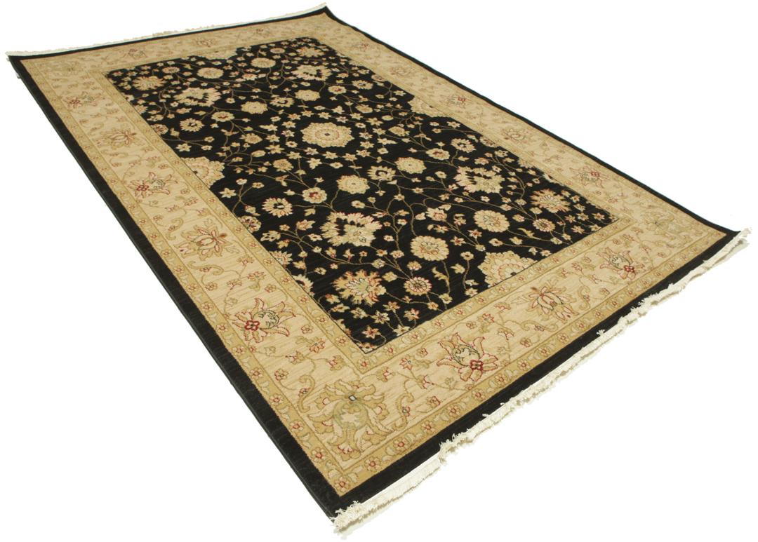 A rectangular floral rug with a black field and beige border.