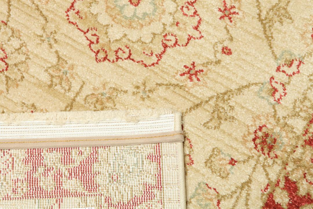 Farahan Ziegler løber i beige og rød