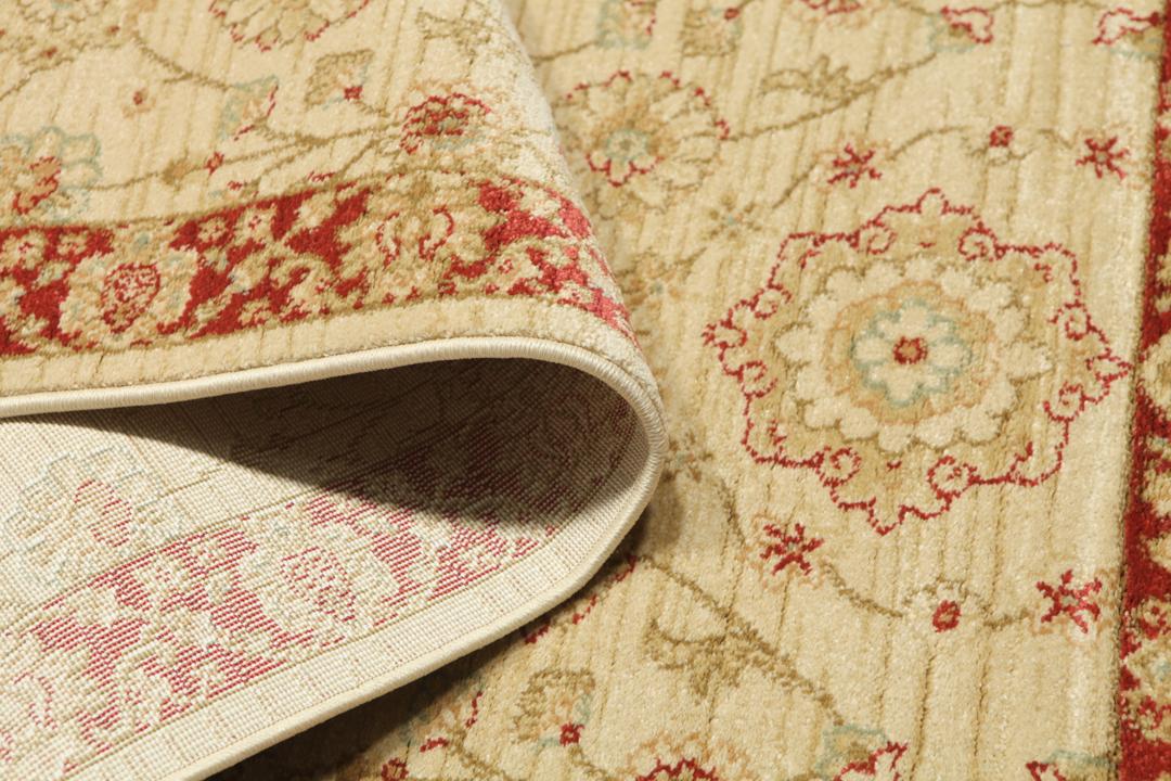 Farahan Ziegler løber i beige og rød