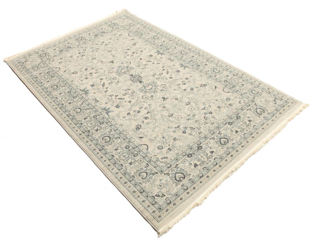 beige en groen tapijt met franjes