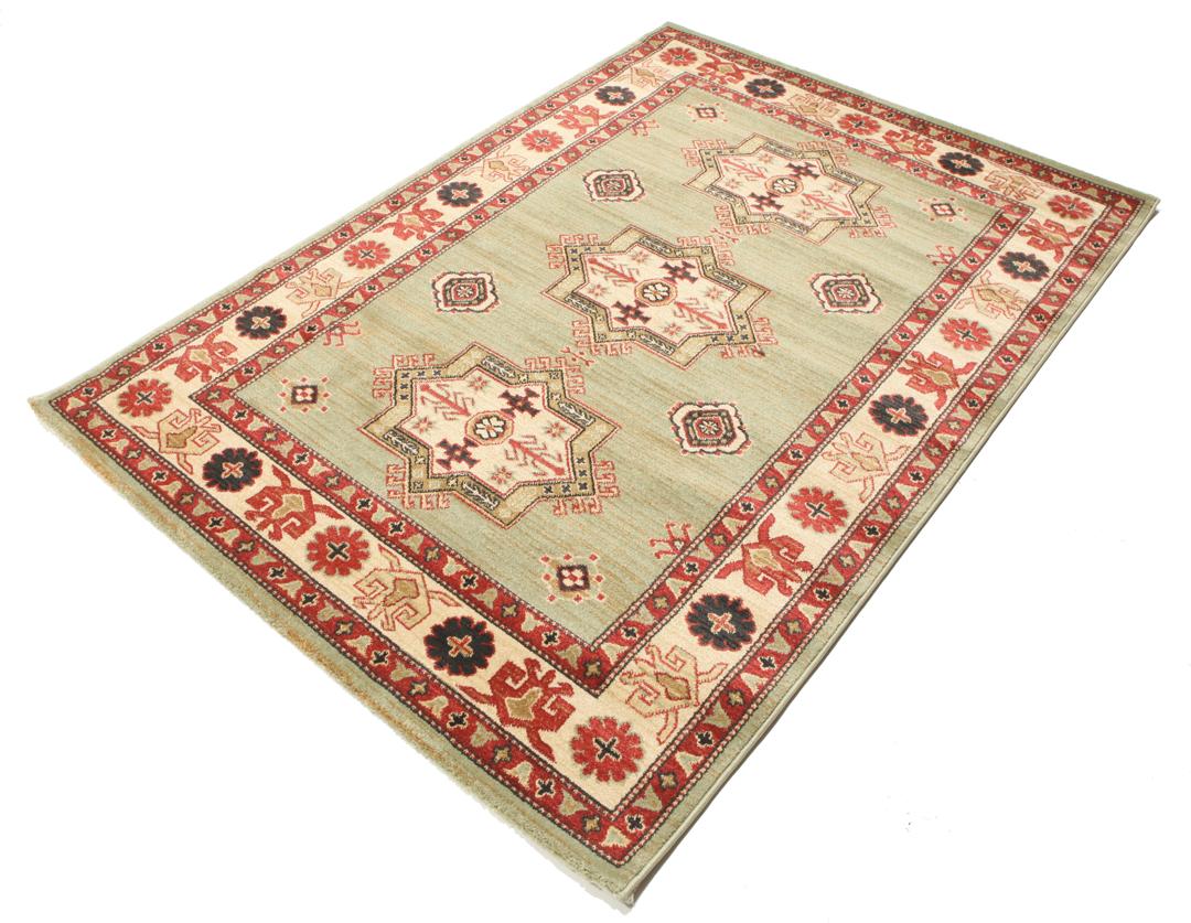 Lichtgroen en crèmekleurig beige vloerkleed met geometrisch patroon