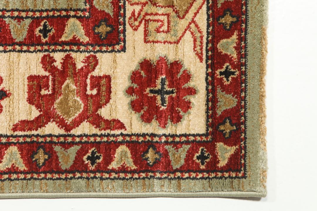Lichtgroen en crèmekleurig beige vloerkleed met geometrisch patroon