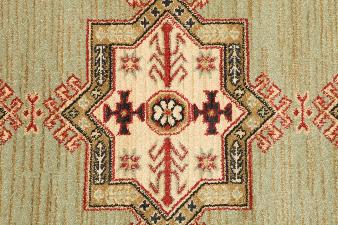 Lichtgroen en crèmekleurig beige vloerkleed met geometrisch patroon
