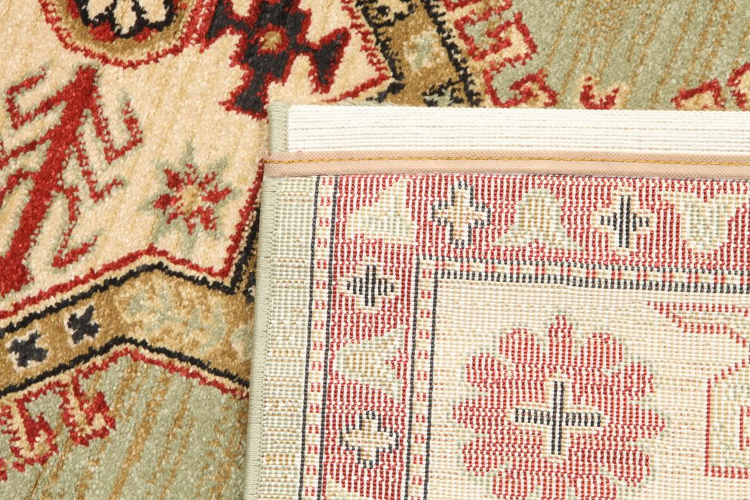 Lichtgroen en crèmekleurig beige vloerkleed met geometrisch patroon