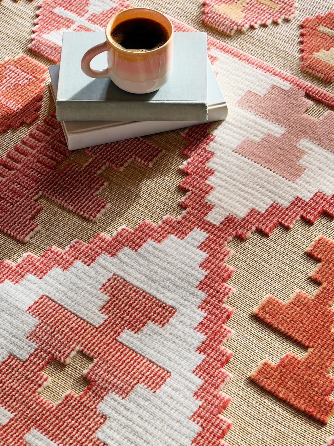 Beige vloerkleed met geometrisch patroon