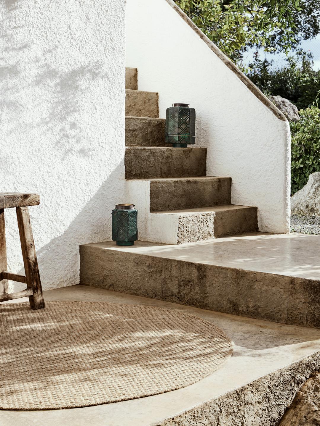 Rond beige vloerkleed