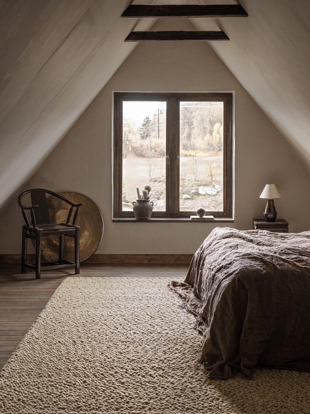 Beige tapijt met een getextureerd oppervlak van lussen