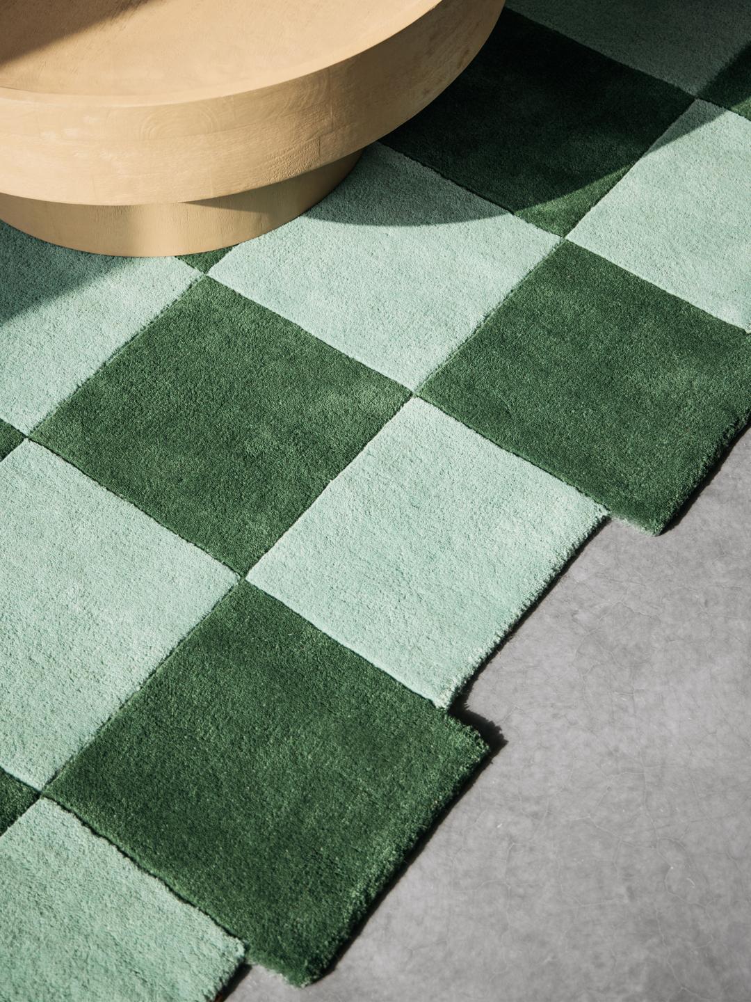 Groene en mintgroene geruite deurmat