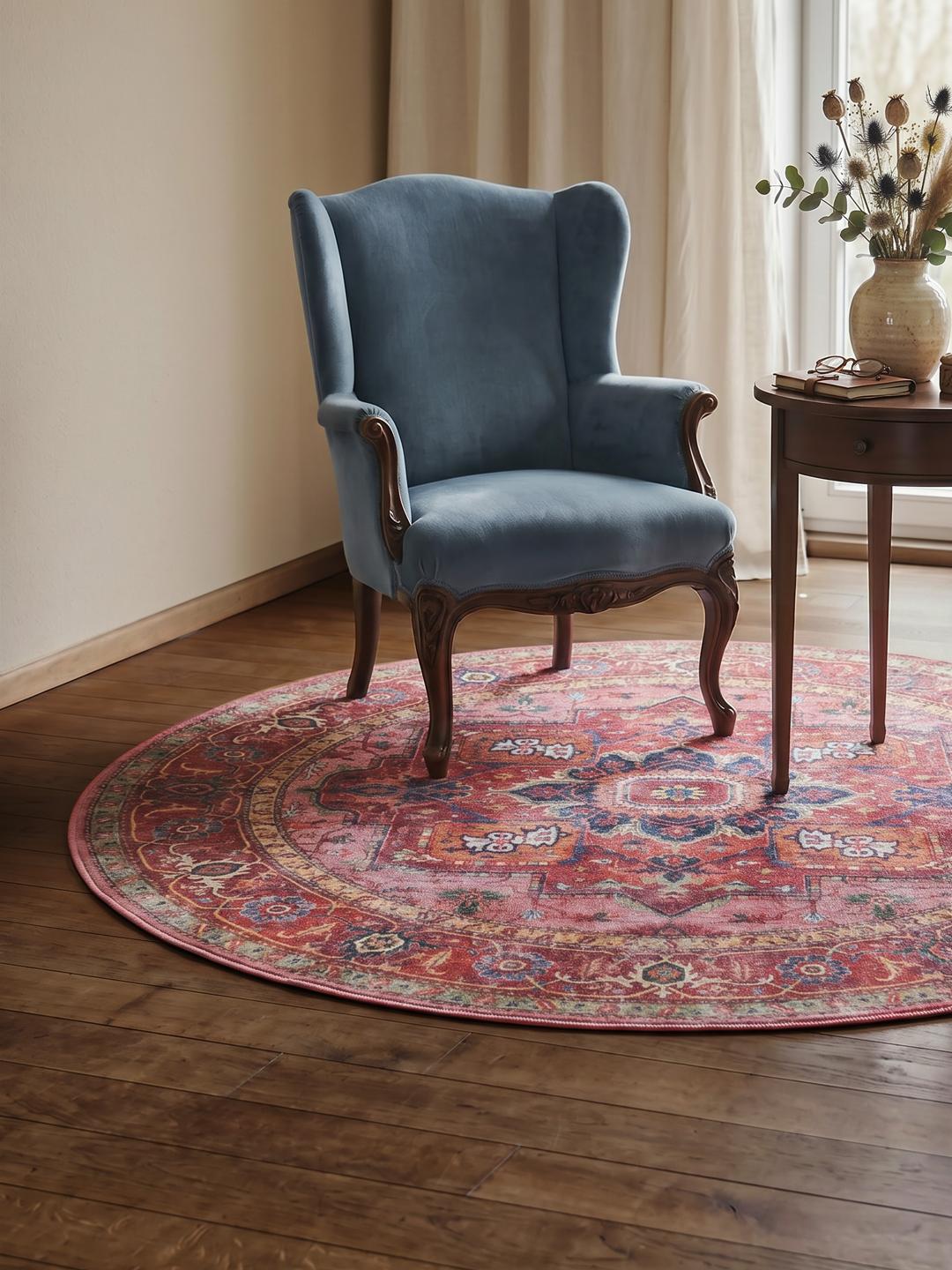 Rond tapijt in rood en roze