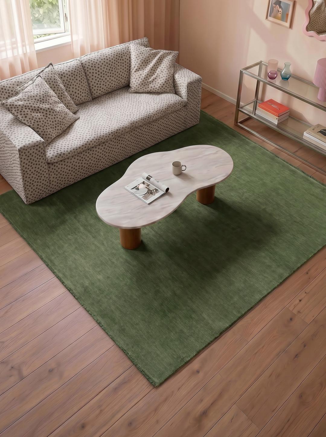 Groen handgeweven poolkleed met korte franjes