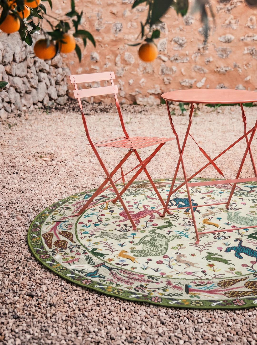 Groen rond tapijt met multicolour diermotieven