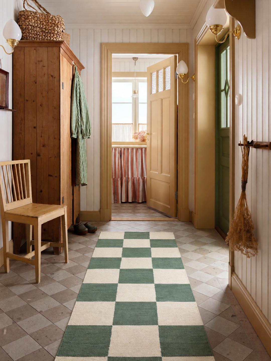 Groene en beige geruite loper