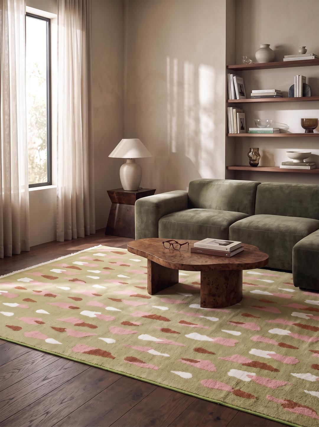 Yellow and pink rug with a playful pattern