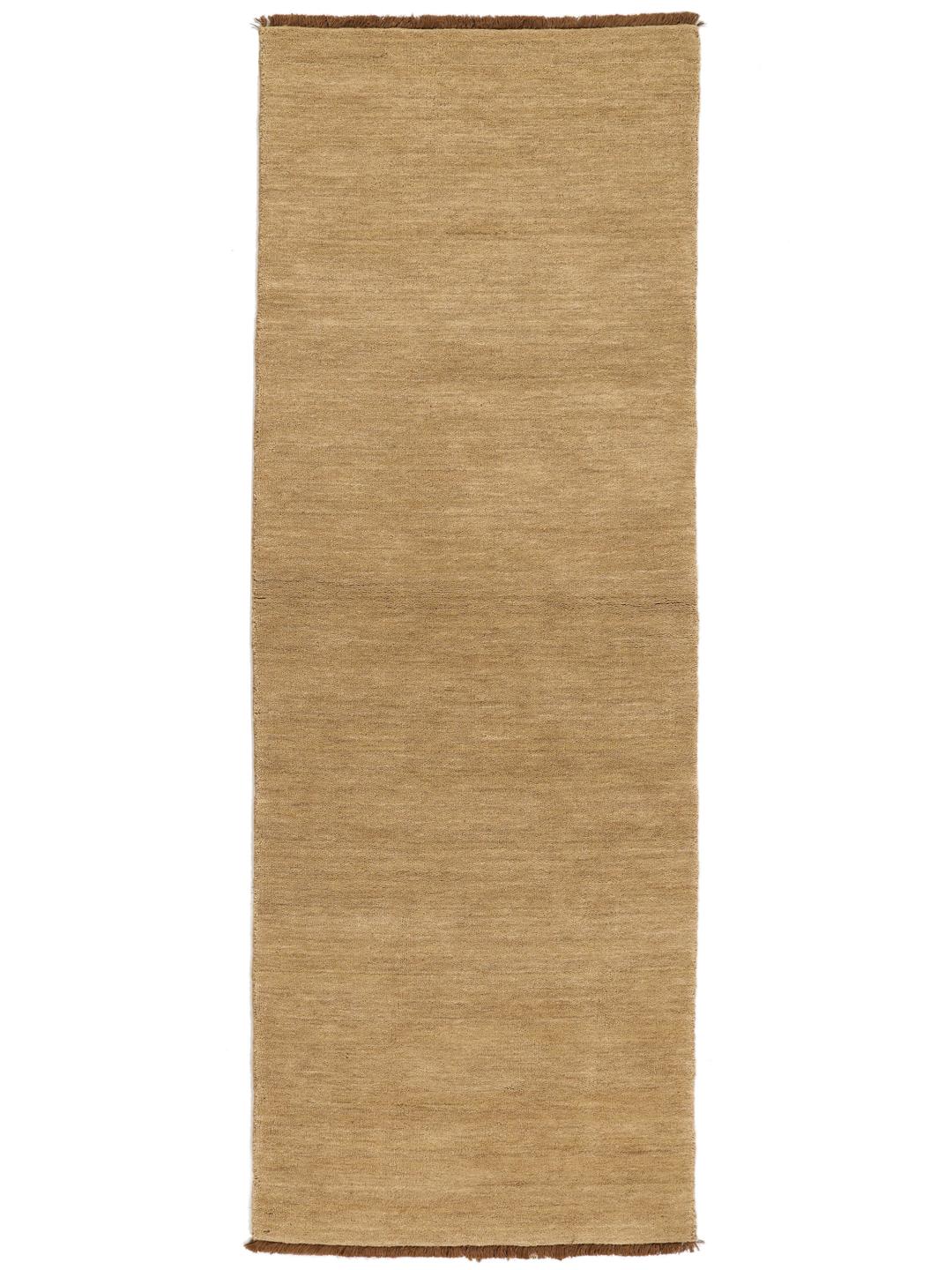 Beige runner rug with short fringes