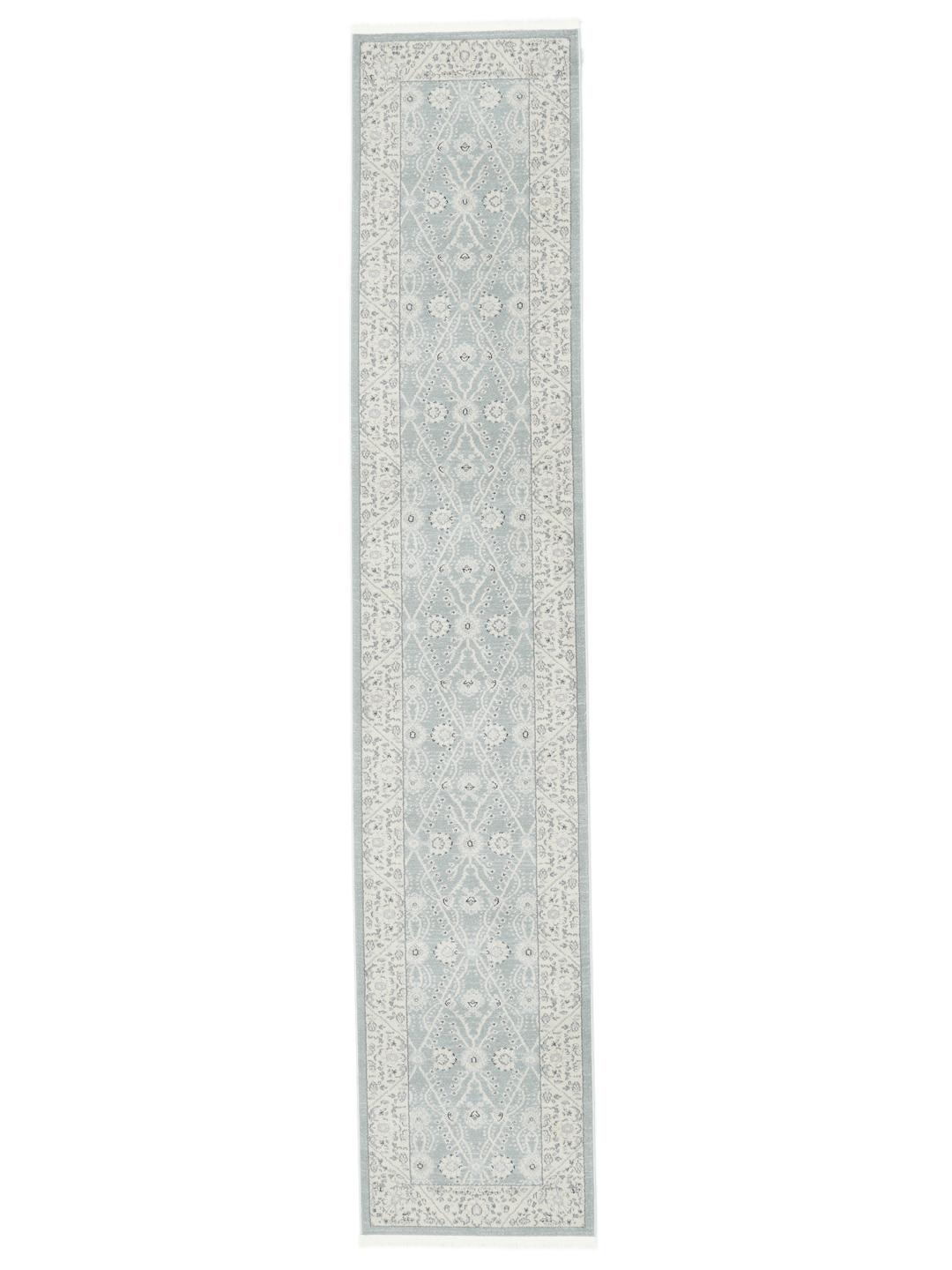 Lyseblå løbertæppe med traditionelle motiver