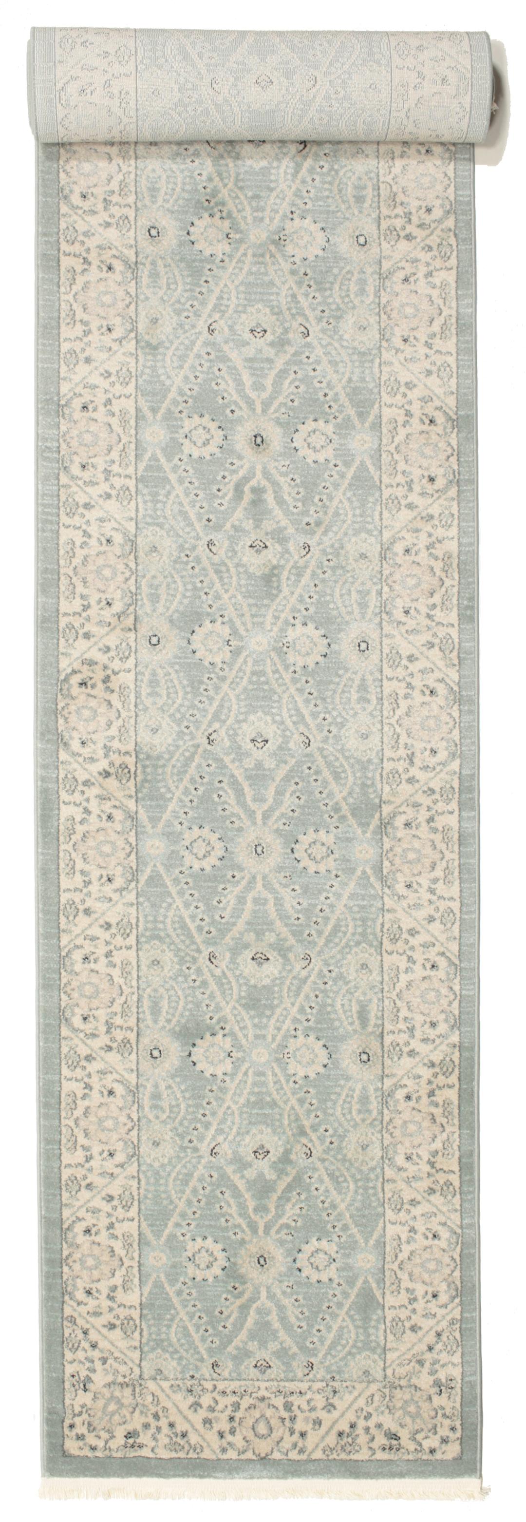 Lichtblauwe loper met traditionele motieven