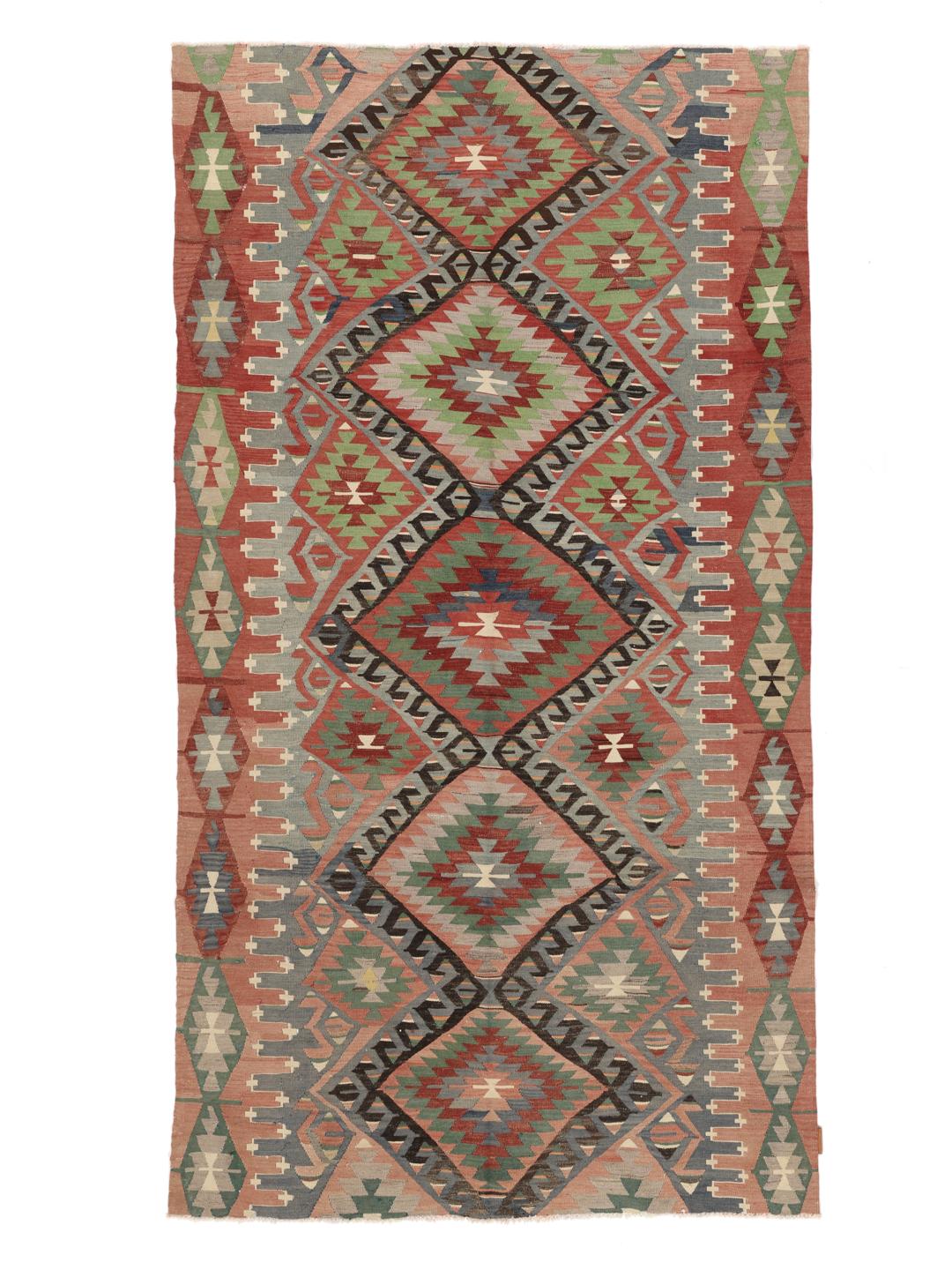 Tapis Kelim turc vintage avec des motifs géométriques dans des tons de rouge, vert et bleu