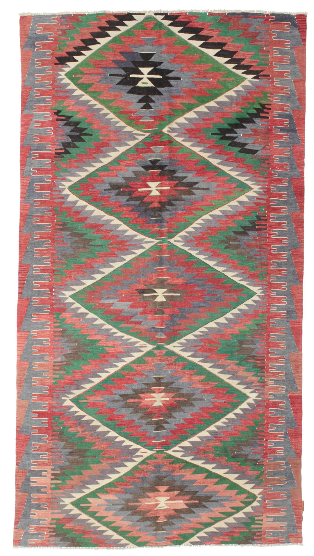 Tapis Kilim turc tissé à la main avec des motifs géométriques en laine multicolore