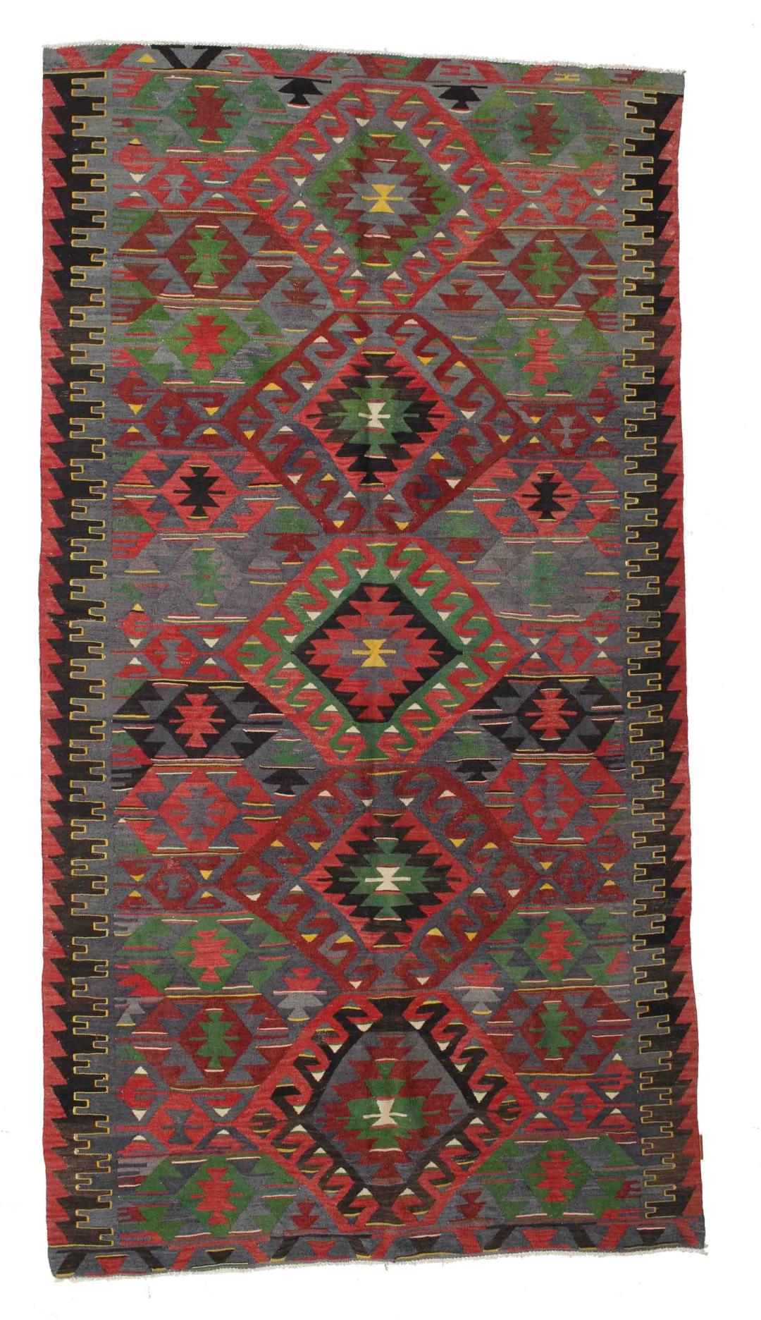 Handgeweven Turks kelim vloerkleed met levendige geometrische patronen in veelkleurige wol.