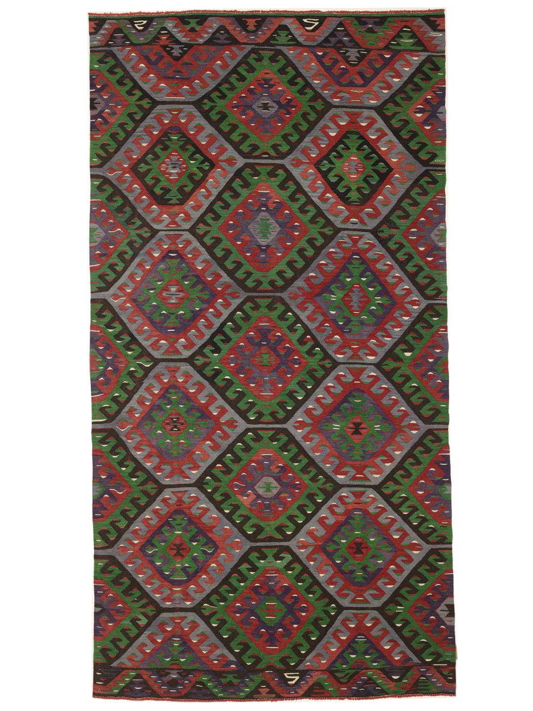 Vintage Turks kelimtapijt met levendige geometrische patronen in een veelkleurig palet