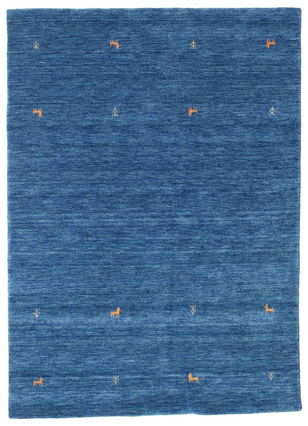 Blauw tapijt met wollen pool en motieven