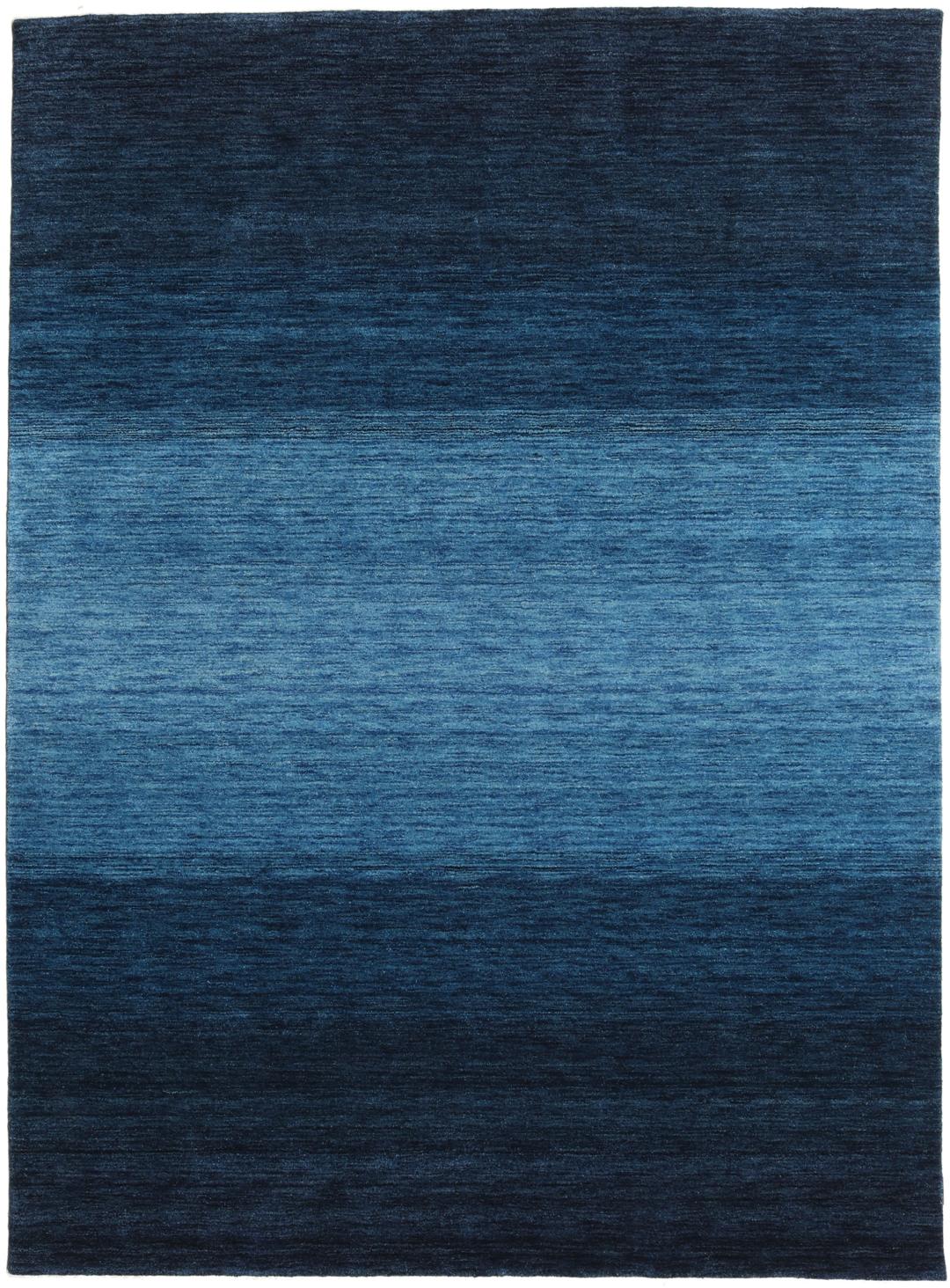 Handgemaakt blauw tapijt met een ombré verloop