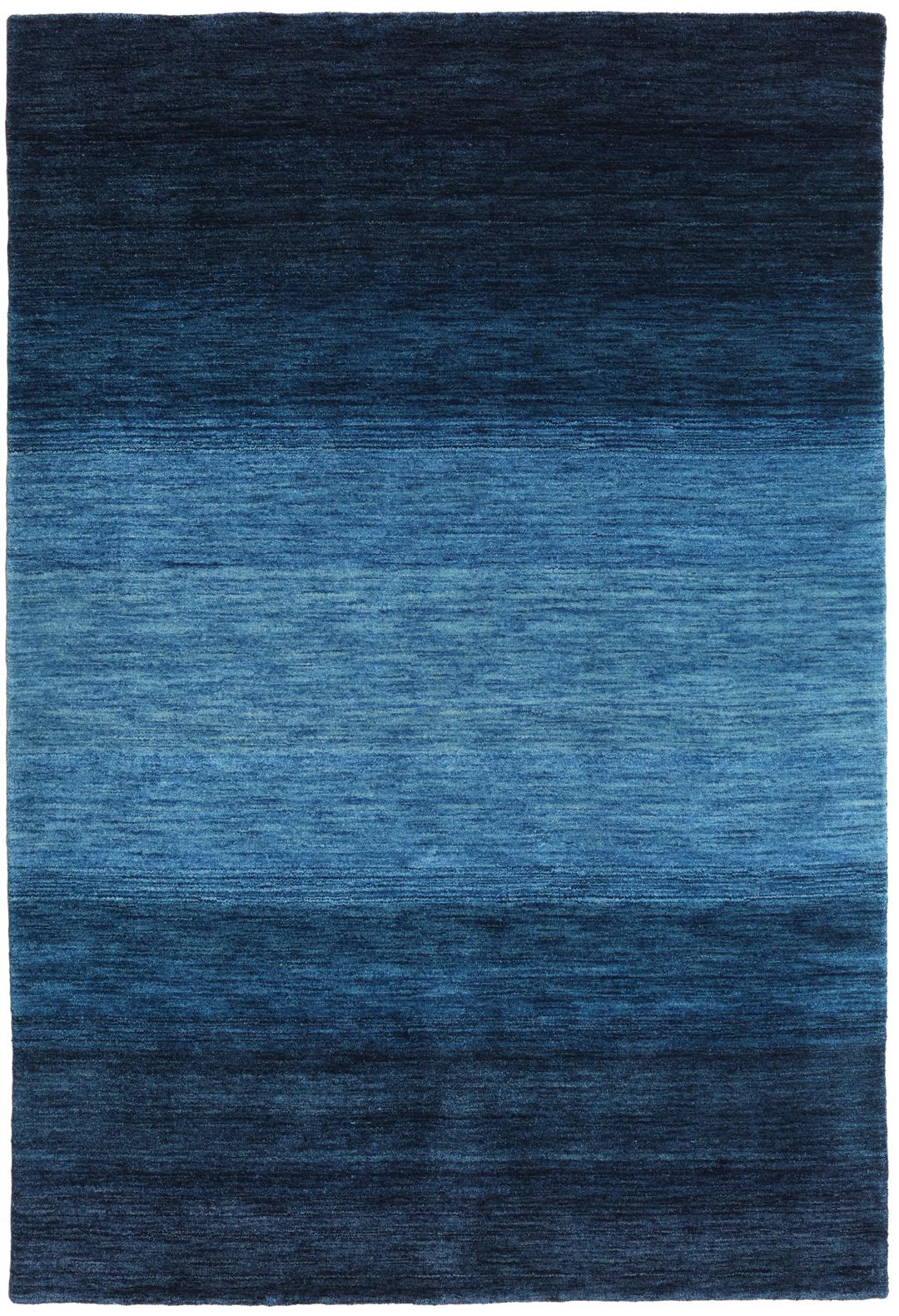 Handgemaakt blauw tapijt met een ombré verloop