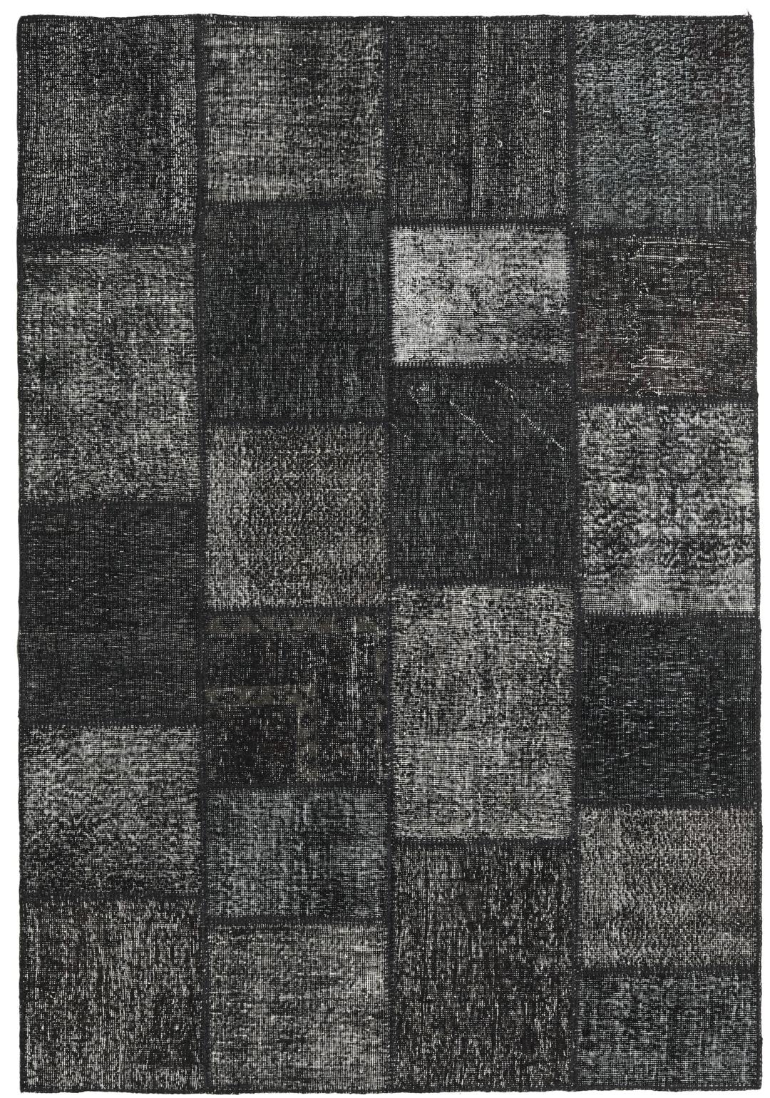 Handgemaakt patchwork vloerkleed uit Turkije in zwarte tinten.