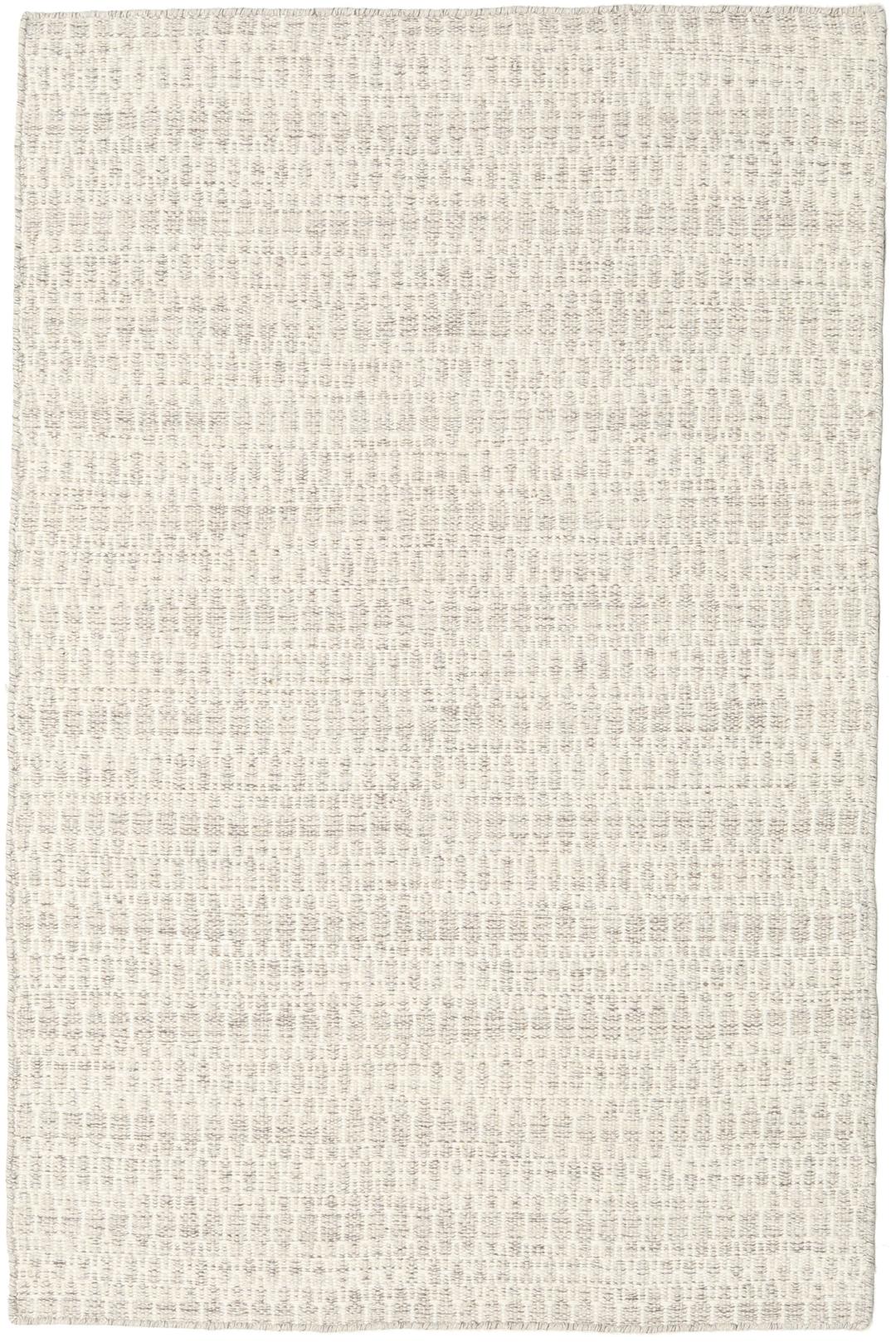 Beige tæppe med et struktureret vævet mønster