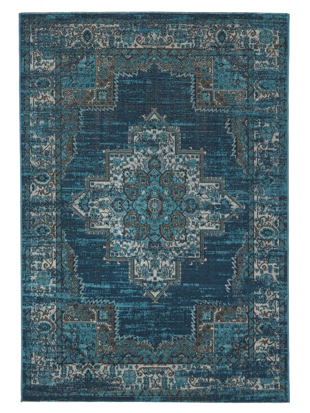 Tapis bleu foncé orné d'un motif traditionnel.