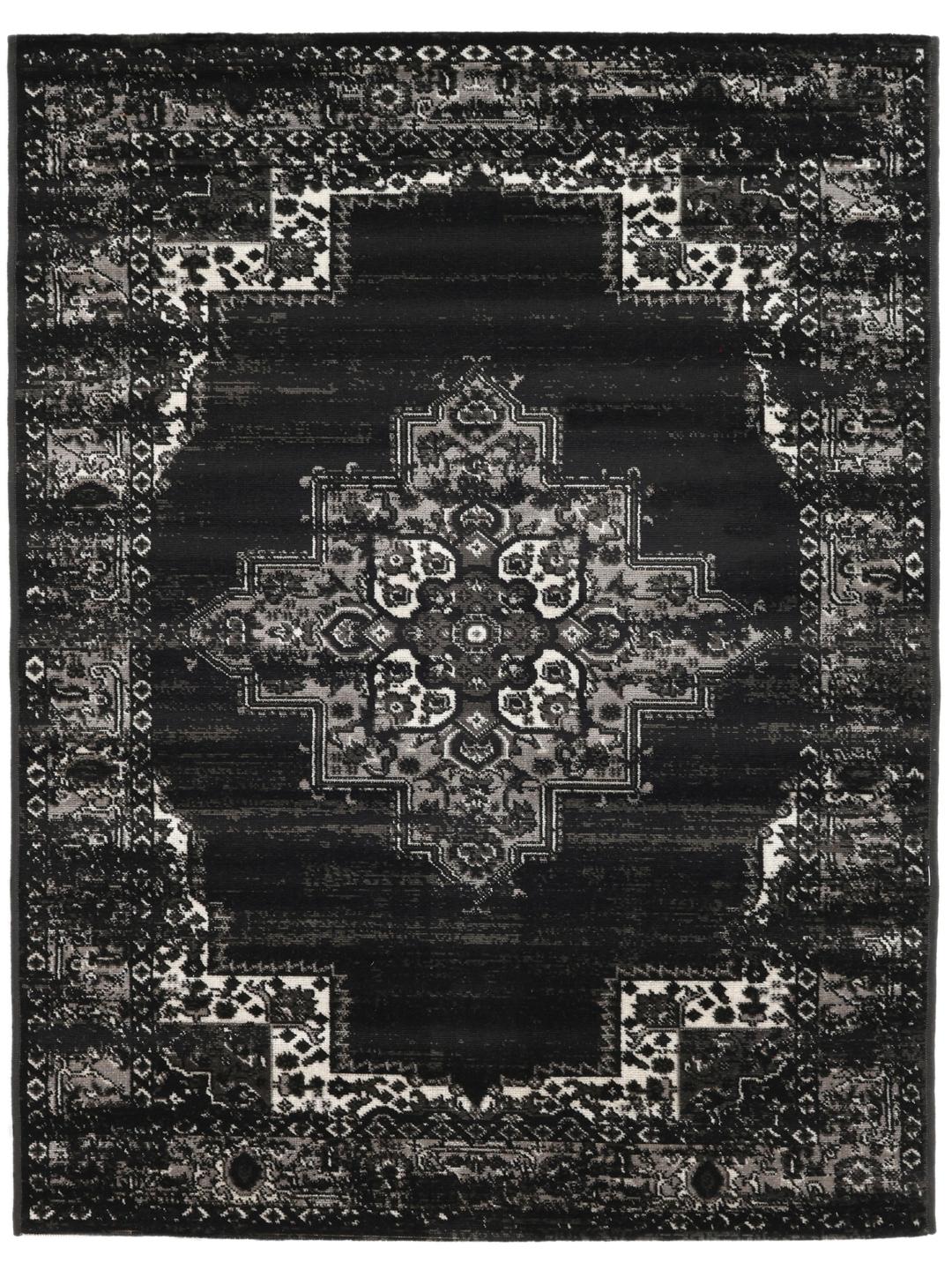 Sort tæppe med et klassisk mønstret design