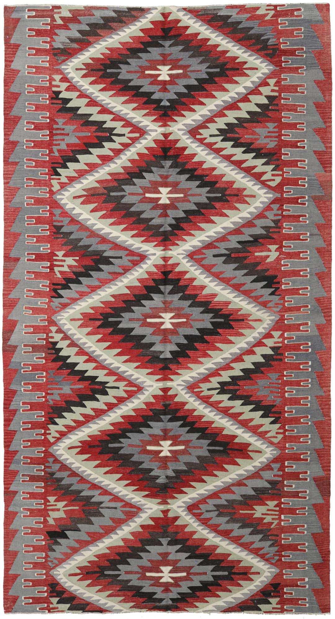 Tapis Kilim turc tissé à la main avec des motifs géométriques en rouge, gris et noir