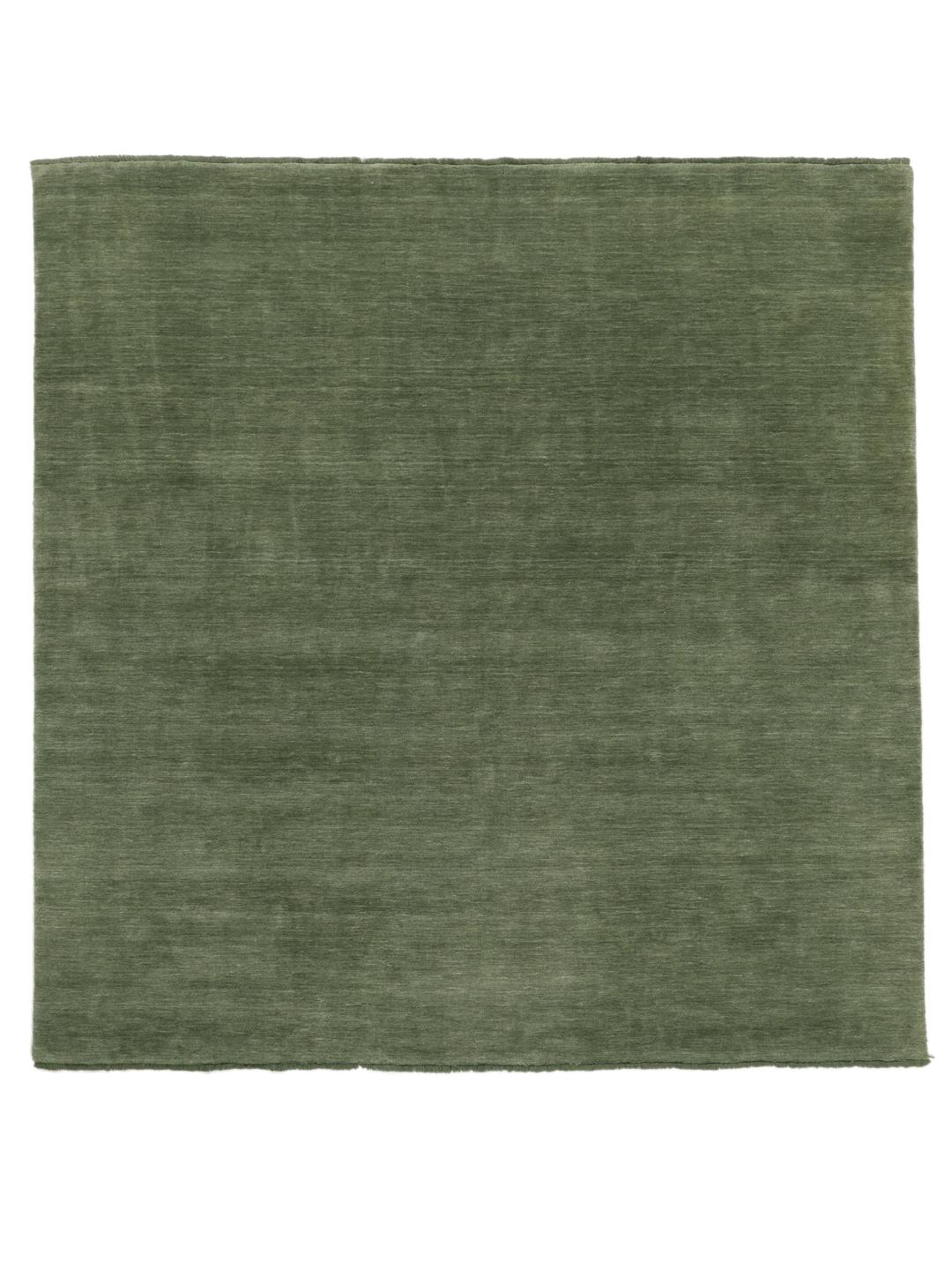 Groen handgeweven poolkleed met korte franjes