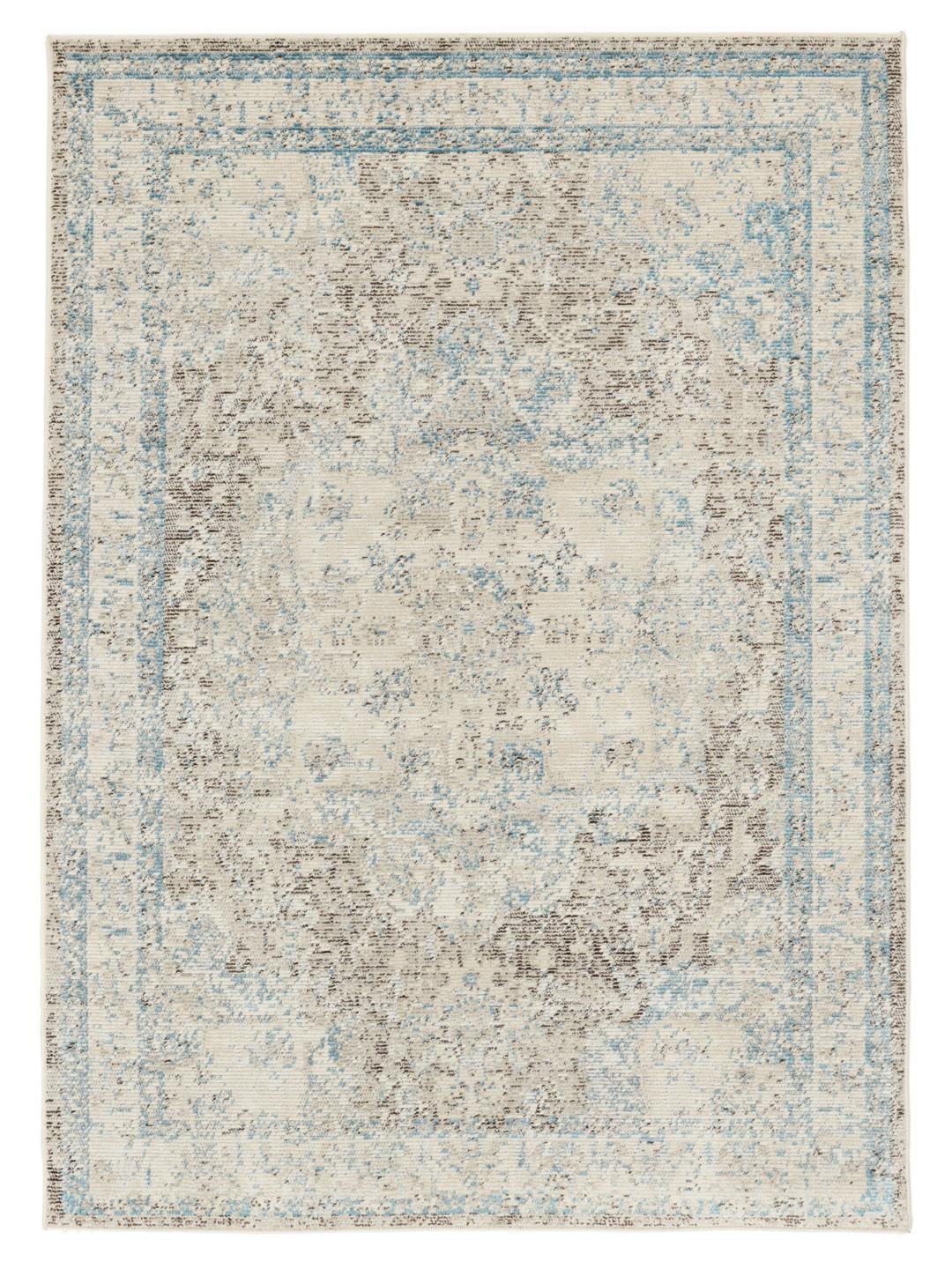 Tapis écru au motif subtil et aux bords frangés