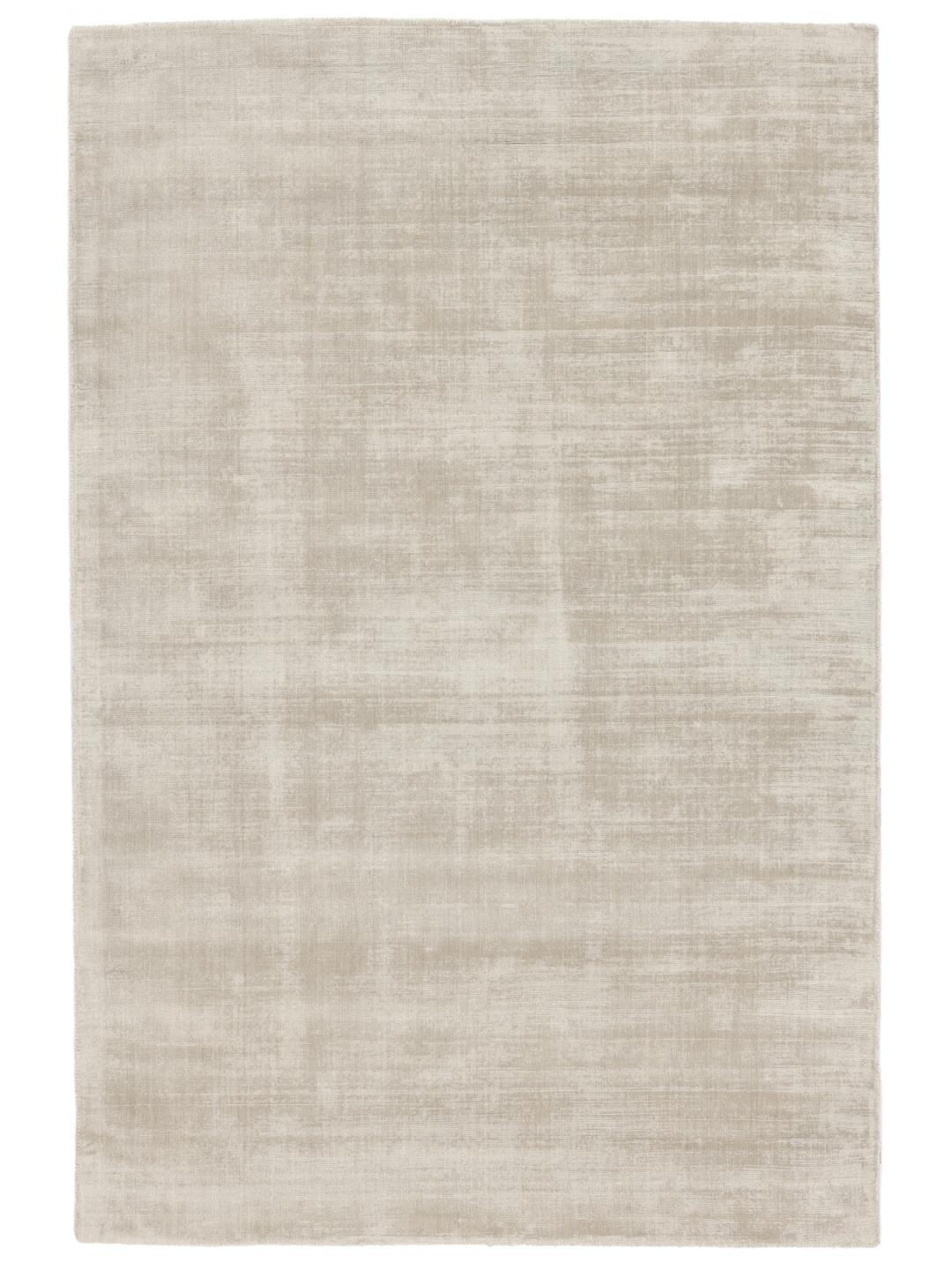 Beige tæppe med en blød luvtekstur