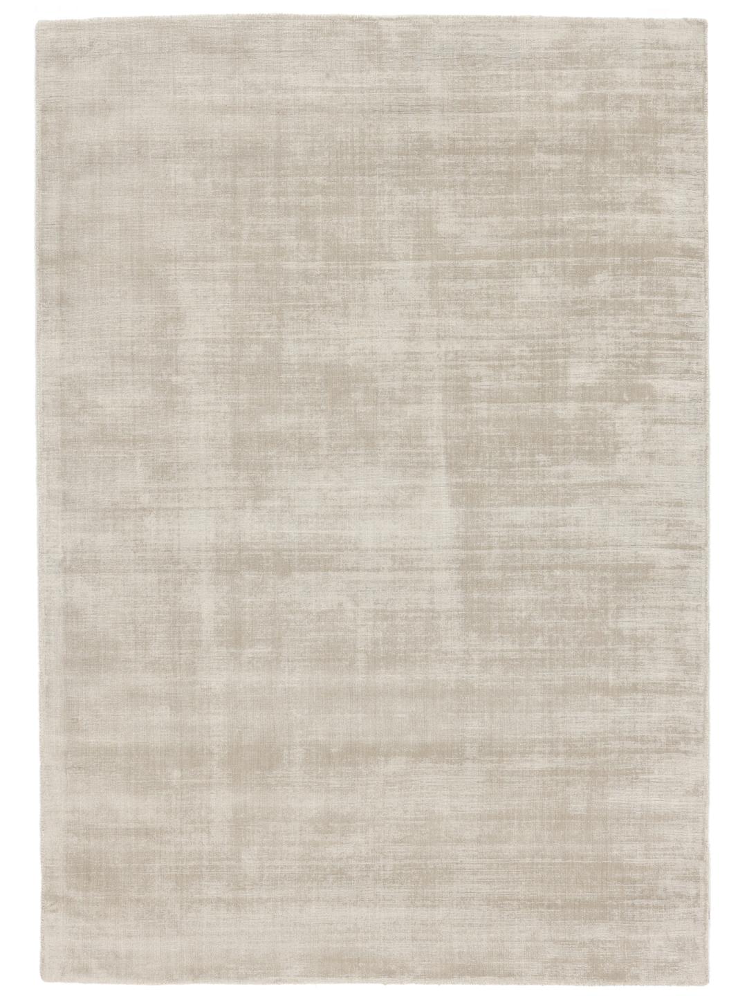 Beige tæppe med en blød luvtekstur