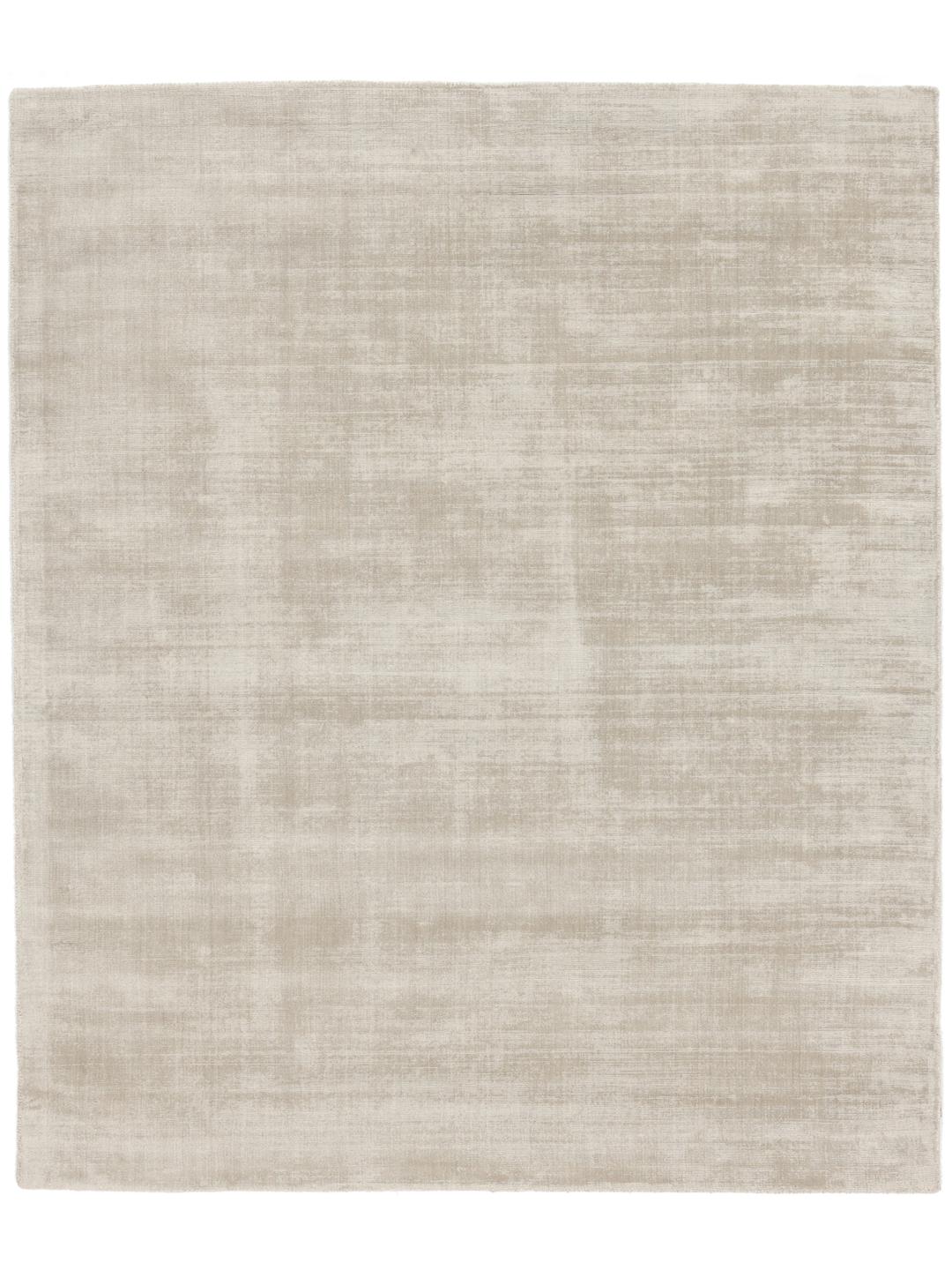 Beige tæppe med en blød luvtekstur